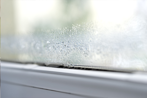 Foggy glass, misted glass, glass with condensation between the glass panes